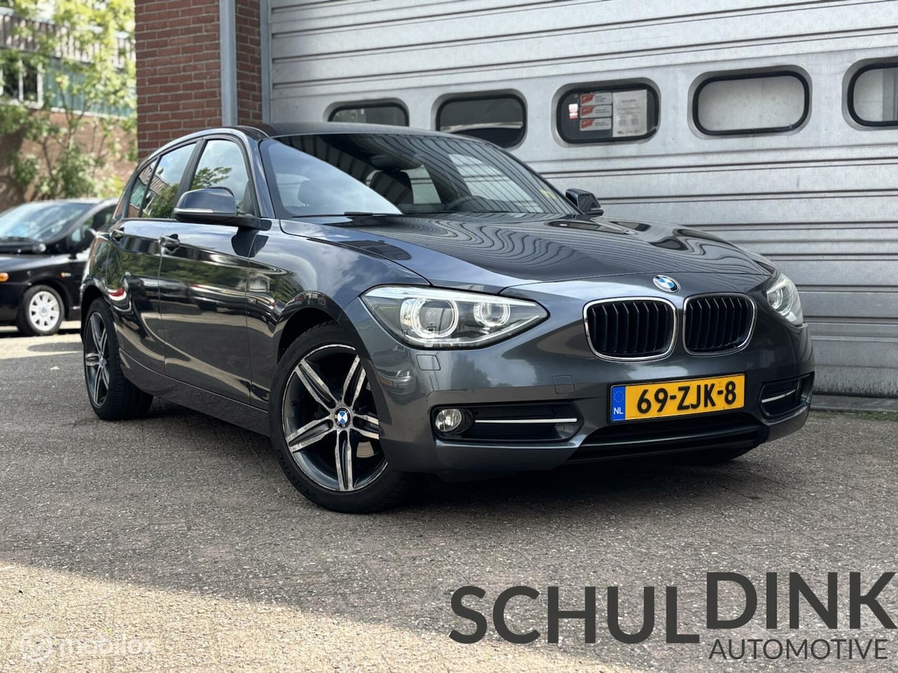 BMW 1-serie - Sport Line AIRCO|AFNEEMBARE TREKHAAK|CRUISE CONTROLE - AutoWereld.nl