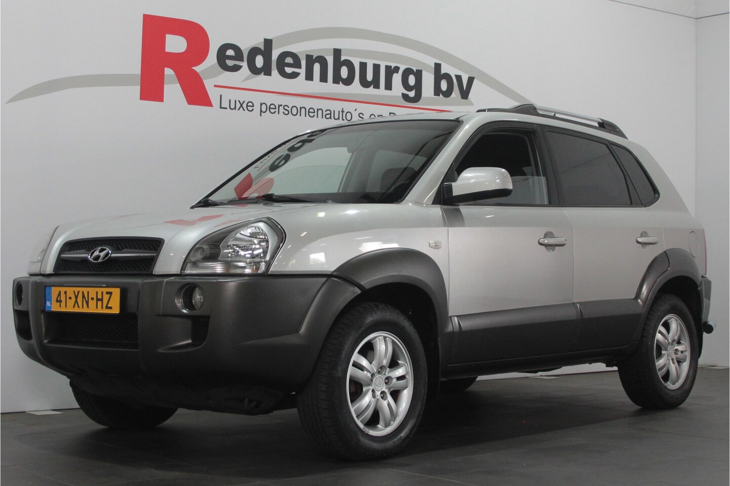 Hyundai Tucson - 2.0i Style Premium - Airco / Cruise / Stoelverw. - AutoWereld.nl
