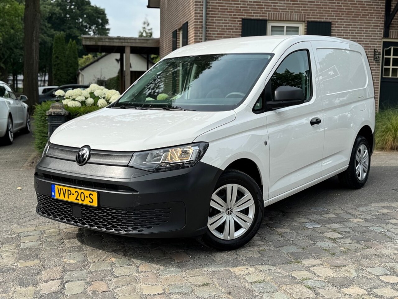 Volkswagen Caddy - 2.0 TDI 75pk Comfort airco,cruise,pdc,zijdeur - AutoWereld.nl