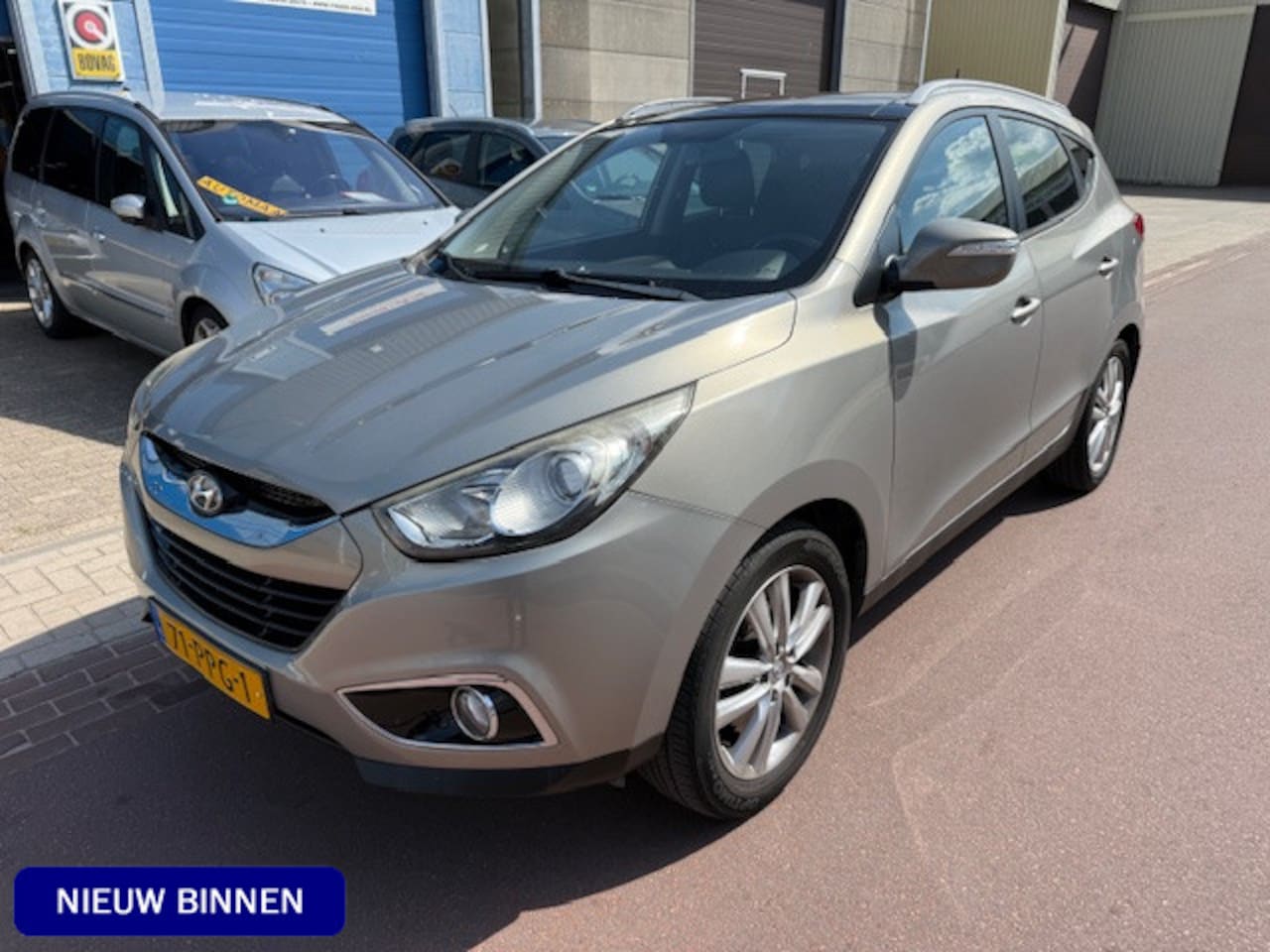 Hyundai ix35 - 2.0i i-Catcher Automaat BTW 143.024km NAP Luxe uitvoering met LEDER, Navigatie, Schuifdak, - AutoWereld.nl