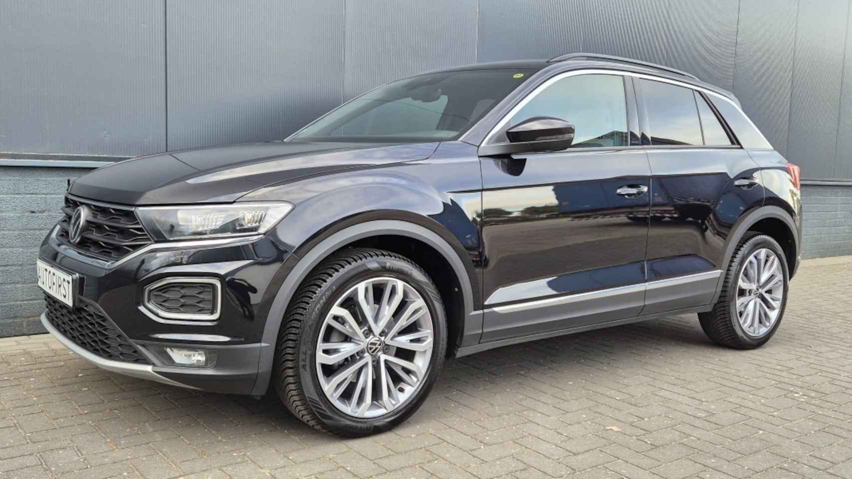 Volkswagen T-Roc - 1.5 TSI Sport BnsR*navi*clima*Led*lane ass*vitrual*18*camera*aut - AutoWereld.nl