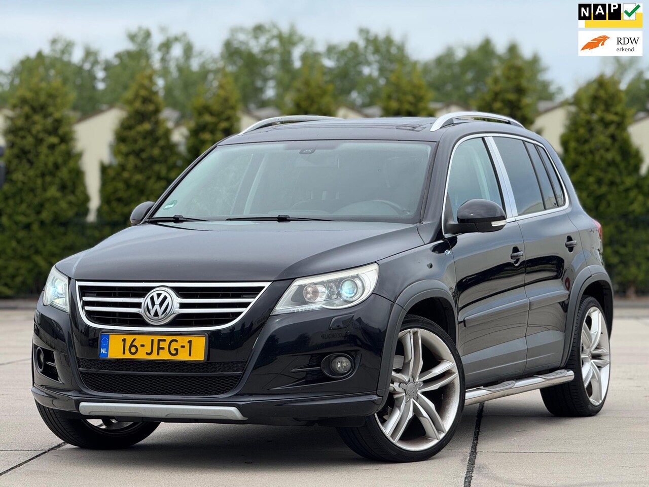 Volkswagen Tiguan - 1.4 TSI Sport&Style 4Motion | Panoramadak | Elektrische sportstoelen met leder | Achteruit - AutoWereld.nl