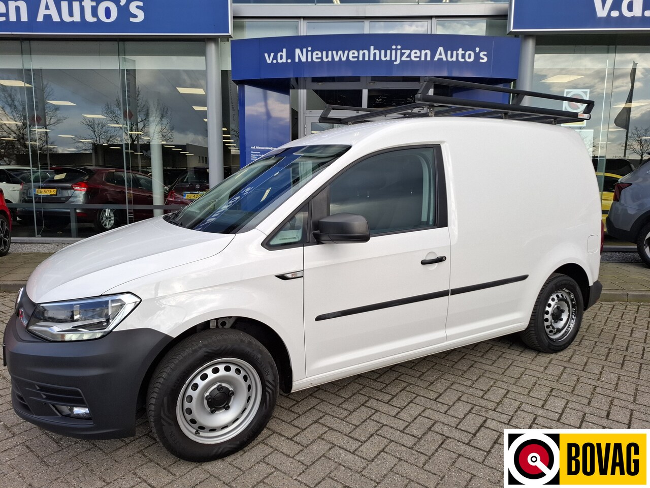 Volkswagen Caddy - 2.0 TDI L1H1 BMT Comfortline | airco | cruise control | park assist | trekhaak | imperiaal - AutoWereld.nl
