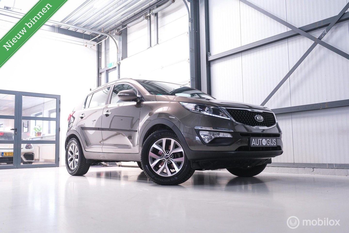 Kia Sportage - 1.6 GDI BusinessLine | Trekhaak | Navigatie | Bluetooth | NL auto NAP | All season banden - AutoWereld.nl
