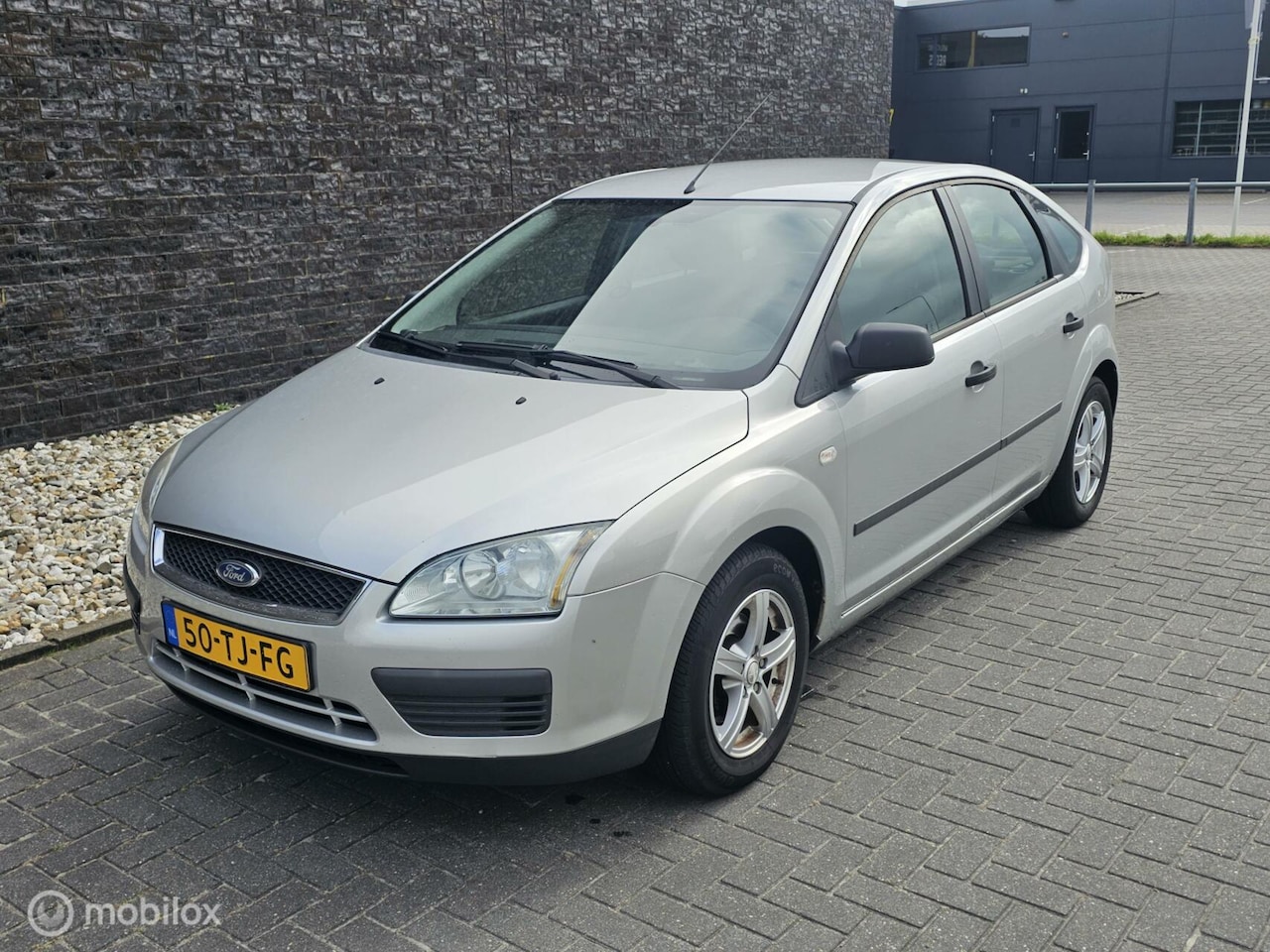 Ford Focus - 1.4-16V Ambiente Airco - Trekhaak - AutoWereld.nl