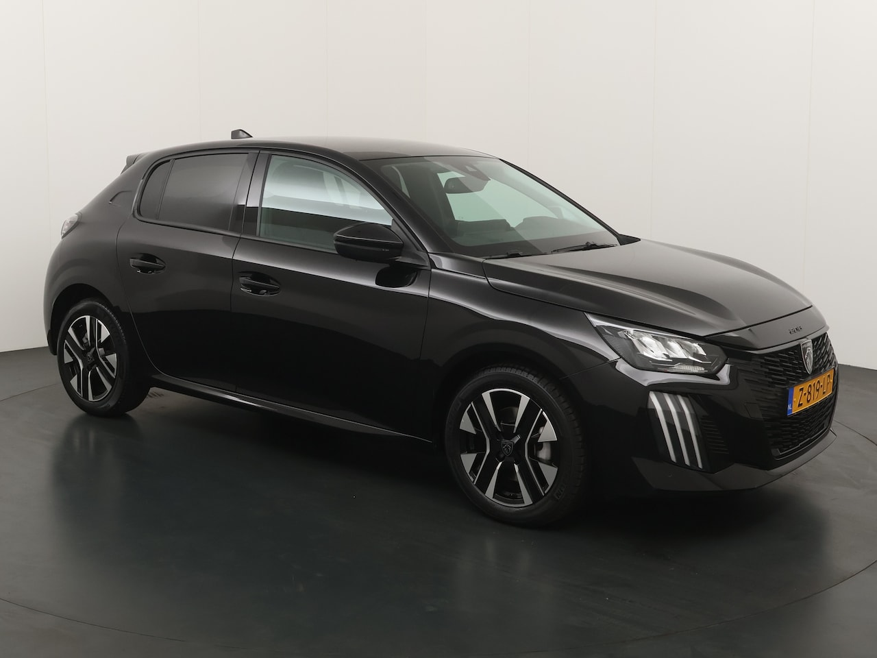 Peugeot 208 - 1.2 Turbo 100PK Allure navi/clima/16"LM /cruise/camera/pdc - AutoWereld.nl