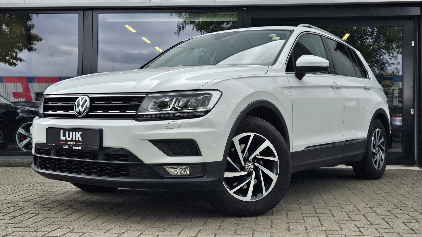 Volkswagen Tiguan - 1.4 TSI ACT Comfortline + LED + ADAPT CRUISE + NAVIGATIE + KLIMA - AutoWereld.nl