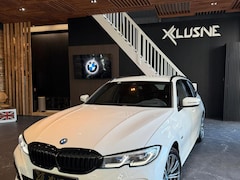 BMW 3-serie Touring - 330e High Executive