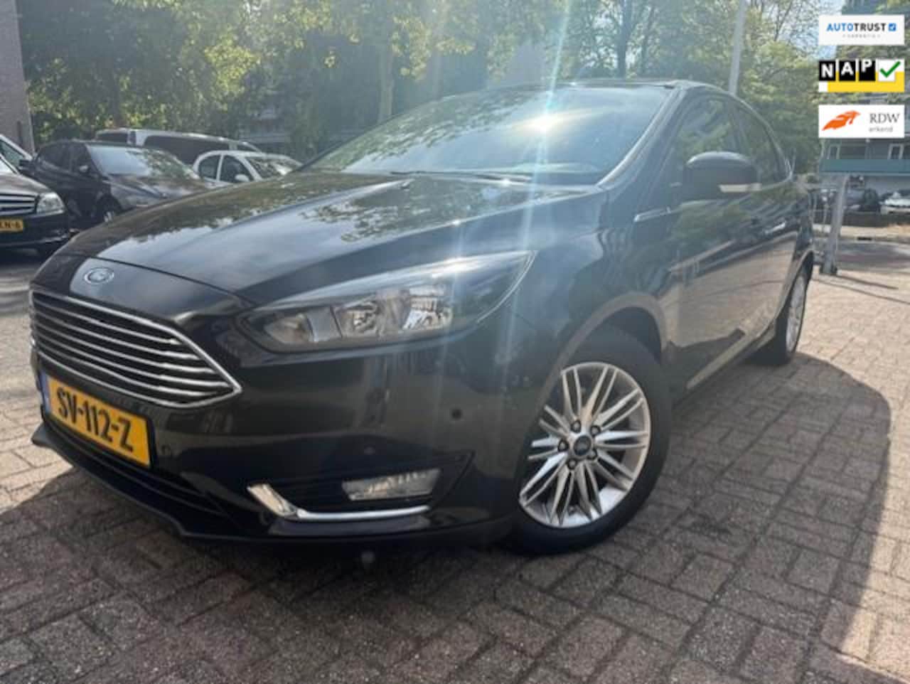 Ford Focus - 1.0 Titanium Edition Navi/Leer/Trekh - AutoWereld.nl
