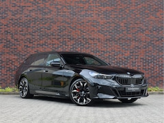 BMW 5-serie Touring - 550e xDrive | Pano - Trekhaak - HUD - B&W