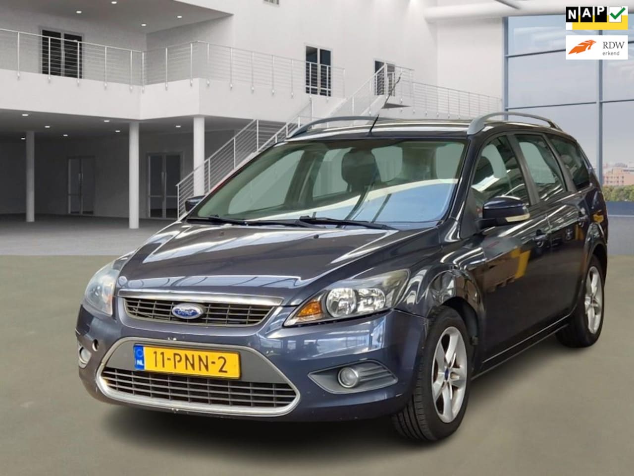 Ford Focus Wagon - 1.6 Comfort/AIRCO/CRUISE/TREKHAAK - AutoWereld.nl