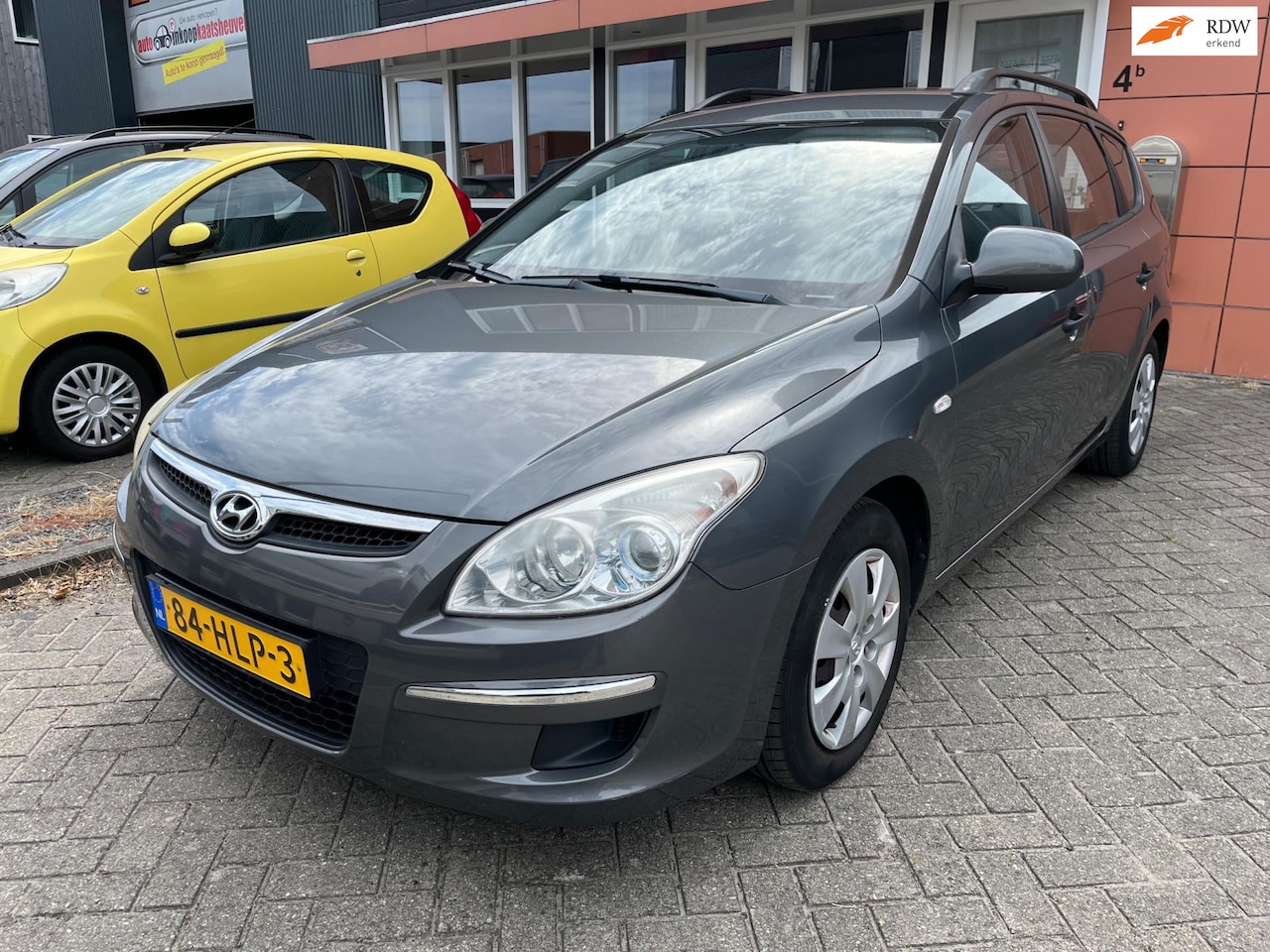 Hyundai i30 CW - 1.6i Active Cool airco boekjes - AutoWereld.nl