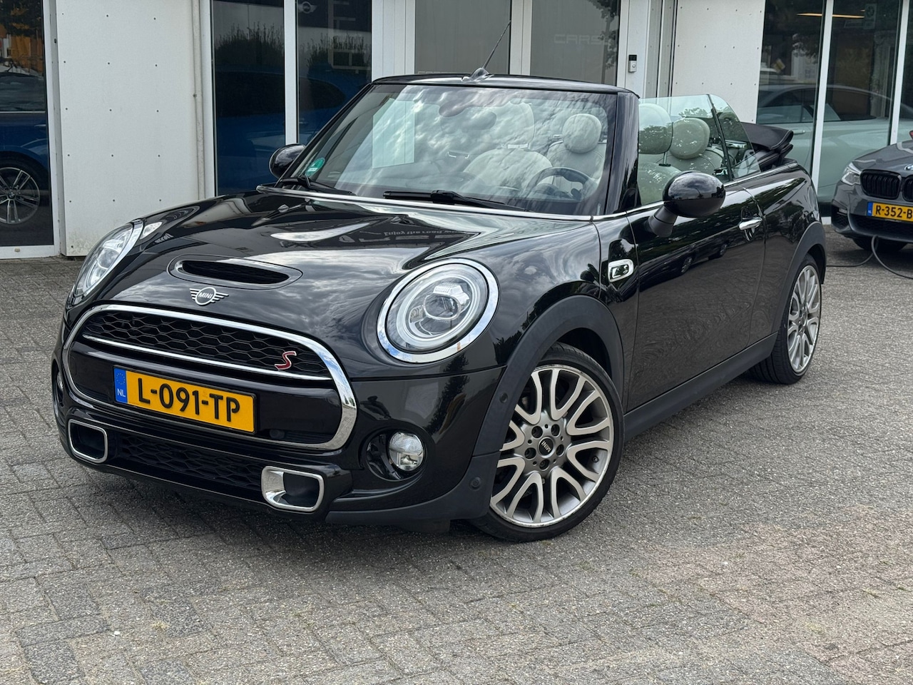 MINI Cabrio - Mini 2.0 Cooper S Chili Cabriolet, Windscherm, Navi, Leder Een proefrit levert het bewijs. - AutoWereld.nl