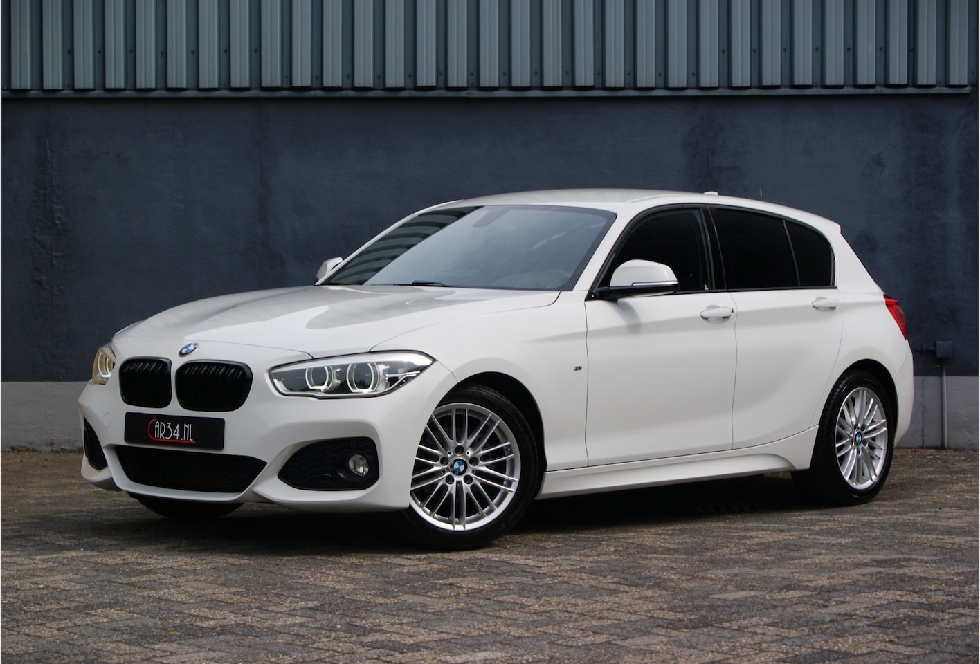 BMW 1-serie - 116i M Sport Facelift Shadow Carplay/PDC/LED/Alarm - AutoWereld.nl