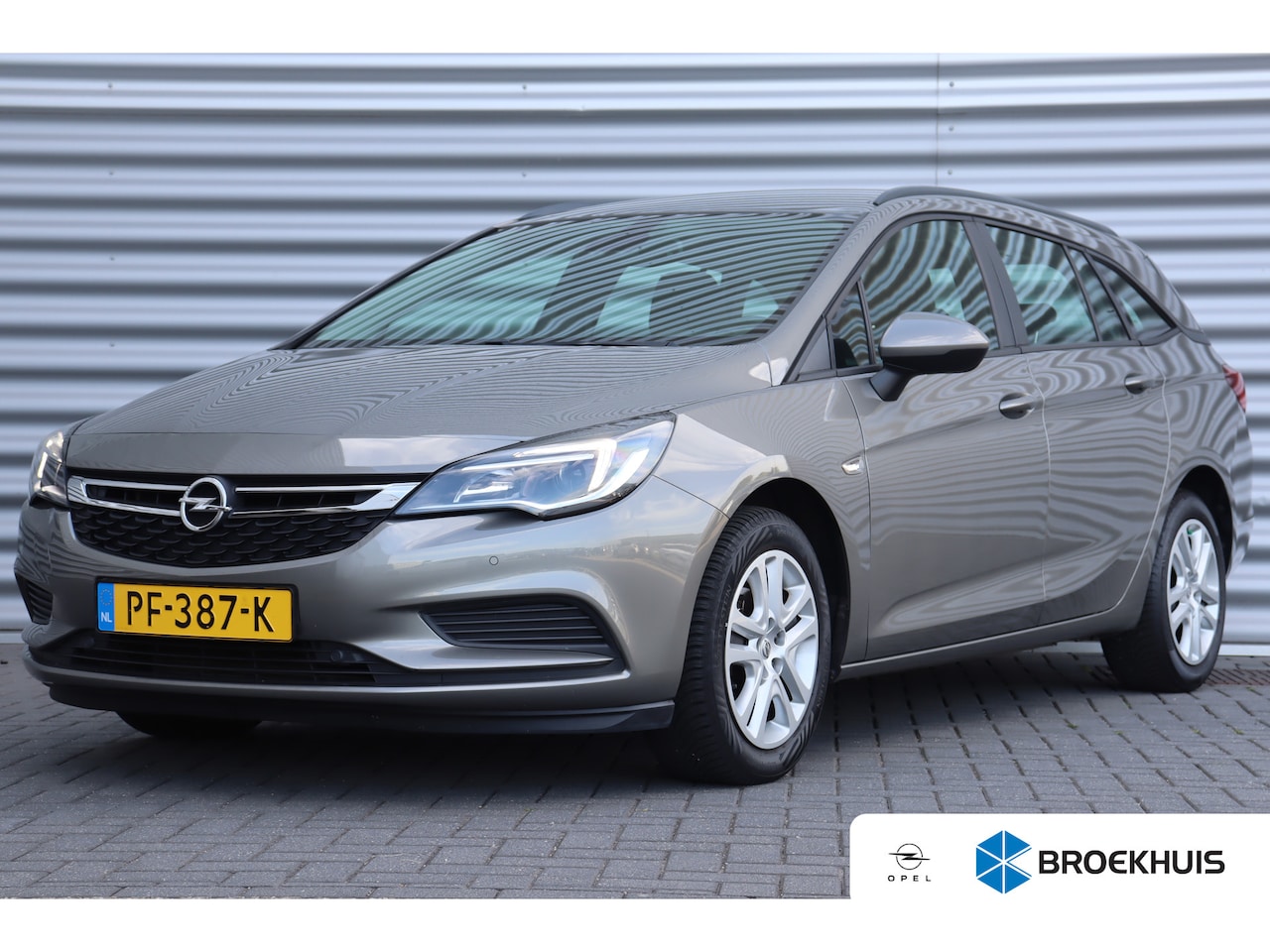 Opel Astra Sports Tourer - 1.0 TURBO 105PK ONLINE EDITION+ / NAVI / AIRCO / LED / PDC / CAMERA / BLUETOOTH / CRUISECO - AutoWereld.nl