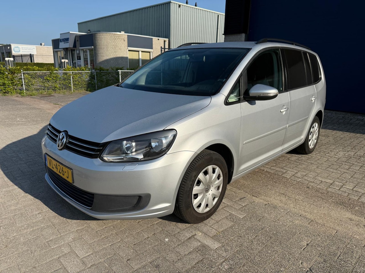 Volkswagen Touran - 1.6 TDI Comfortline BlueMotion grijs kenteken - AutoWereld.nl