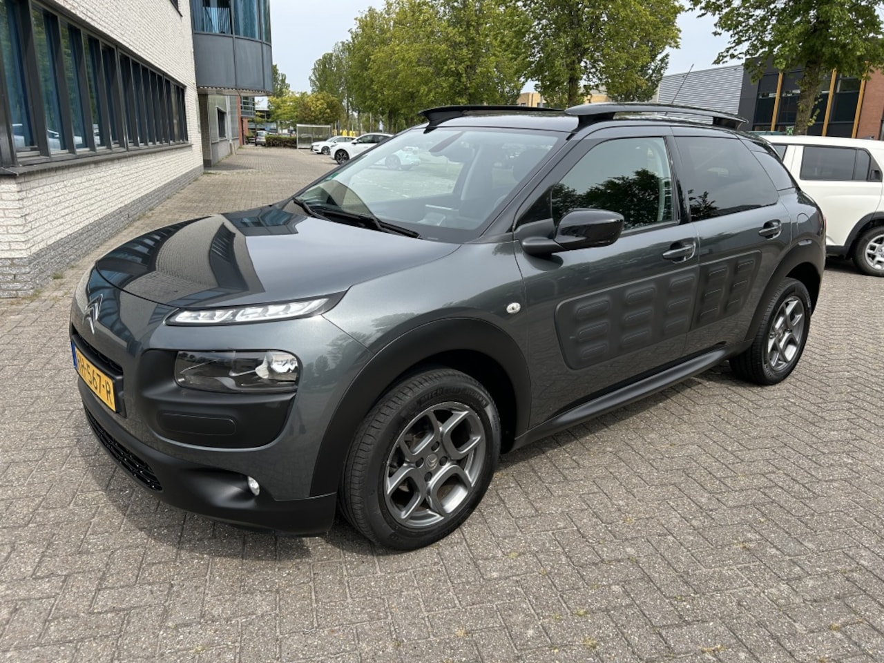 Citroën C4 Cactus - 1.2 PureTech Shine AUT NAVI CRUISE afnTRHK NAP! - AutoWereld.nl
