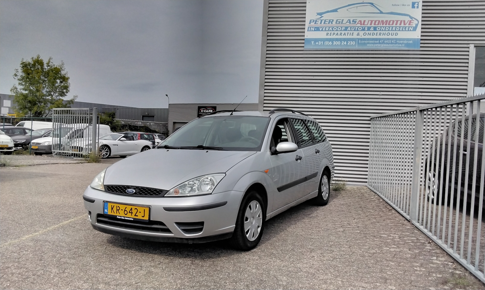 Ford Focus Wagon - 1.4-16V Ambiente - AutoWereld.nl