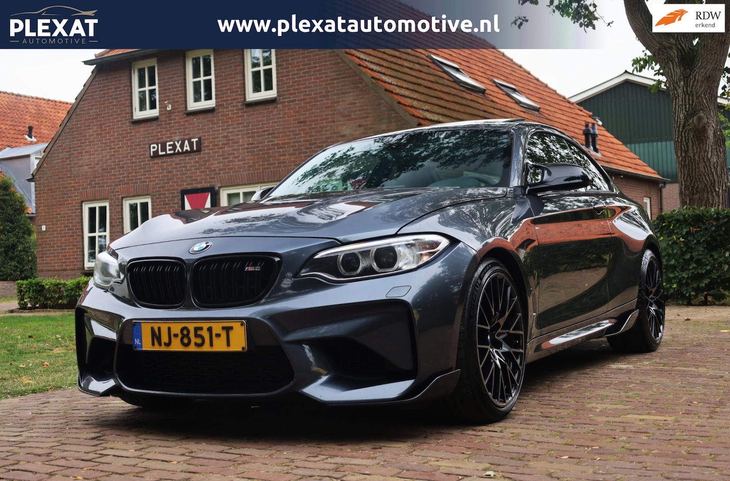 BMW 2-serie Coupé - M2 DCT | Akrapovic Uitlaat | CarbonPakket | Schuifdak | Alcantara interieurdelen | Full Le - AutoWereld.nl