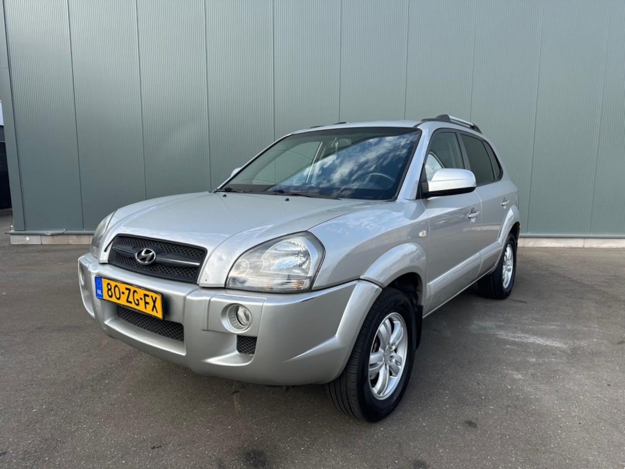 Hyundai Tucson - 2.0i Style CLIMA AIRCO / NAP ! - AutoWereld.nl
