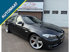 BMW 5-serie - 523i EXE AUT LEER NAVI XENON Y-TIMER INRUIL MOG