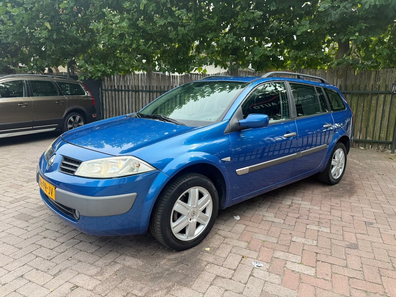 Renault Mégane Grand Tour - 2.0-16V Privilège Comfort Airco Cruise Navi 6-Bak APK 06-2026 - AutoWereld.nl