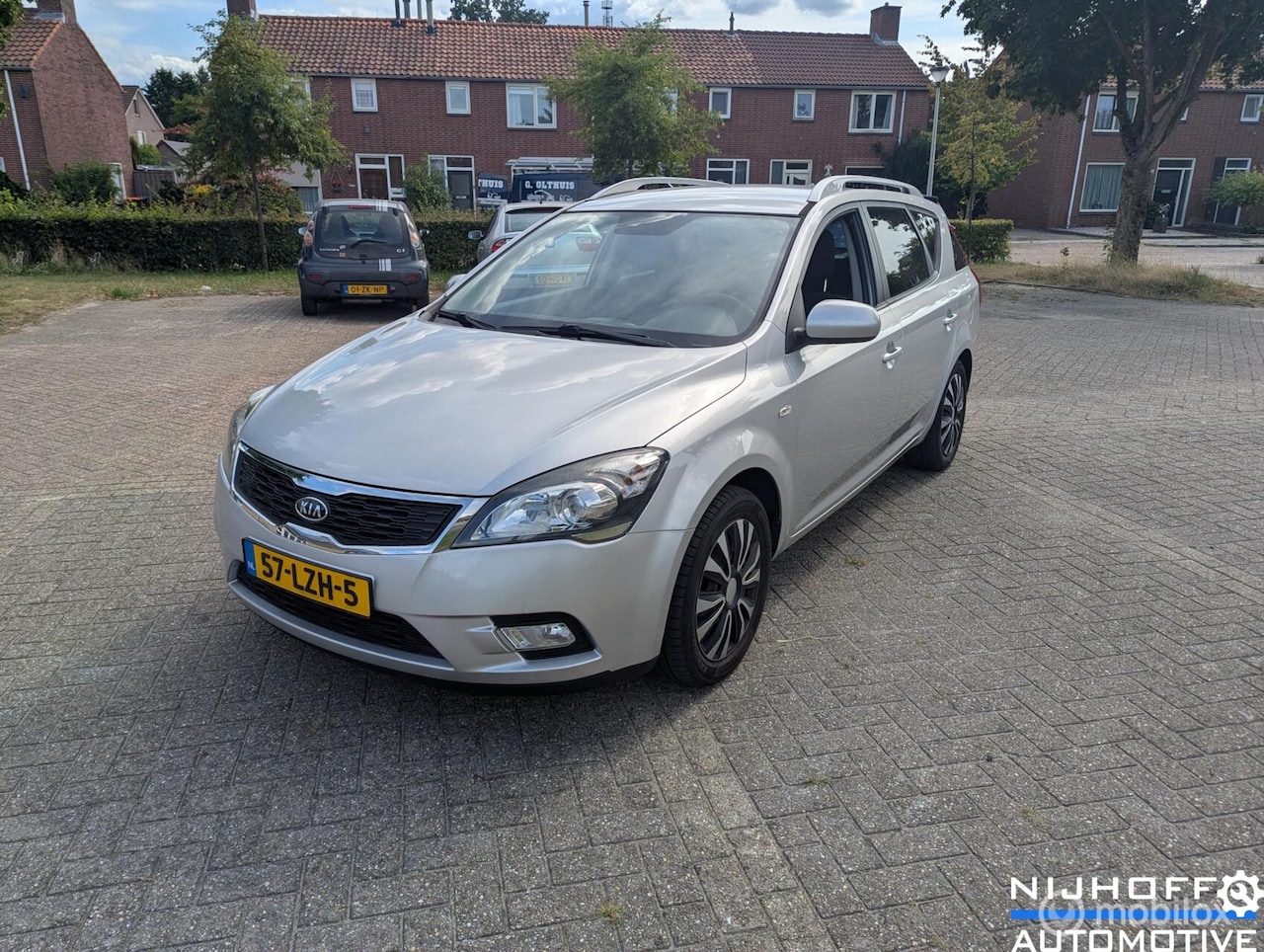 Kia Cee'd Sporty Wagon - 1.4 CVVT X-ecutive 1.4 CVVT X-ecutive - AutoWereld.nl