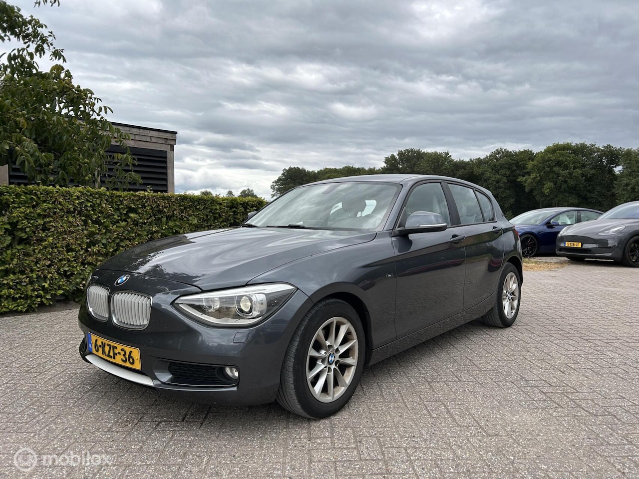 BMW 1-serie - 116d Executive /Aut /Urban /Leer /Navi - AutoWereld.nl