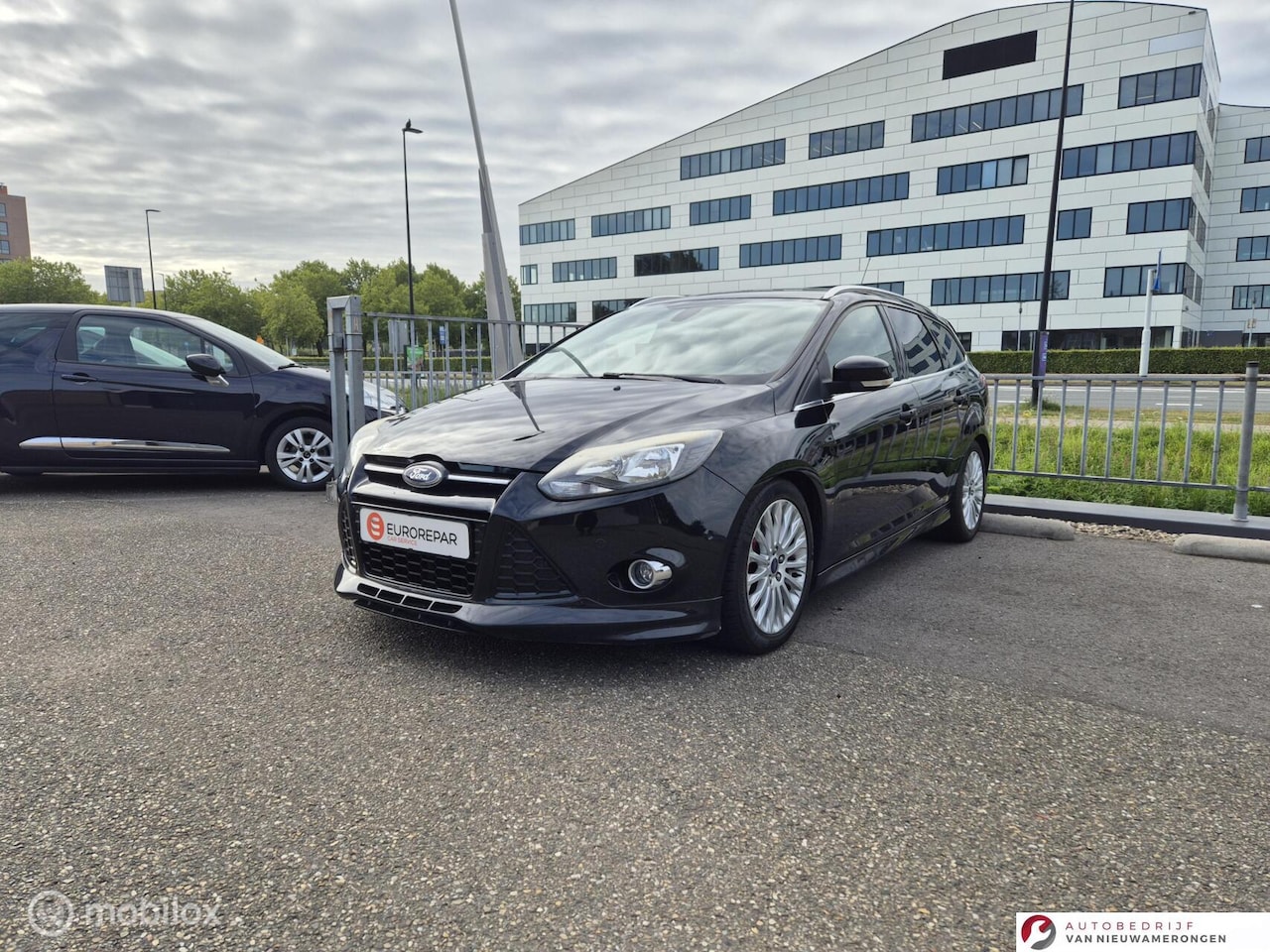 Ford Focus Wagon - 1.0 EcoBoost Titanium St - AutoWereld.nl