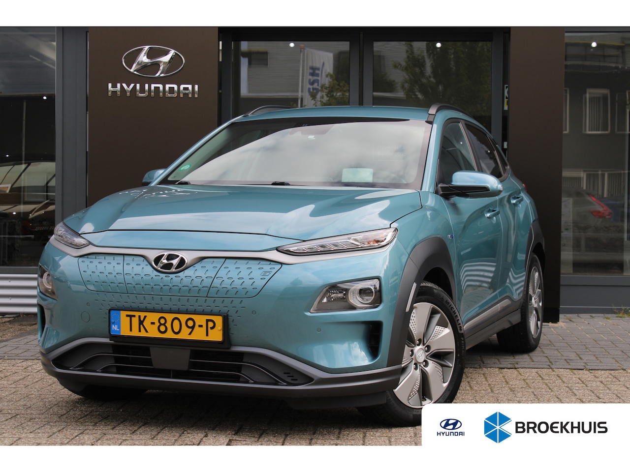 Hyundai Kona Electric - EV Premium 64 kWh | Afneembare trekhaak | Dodehoek detectie | Elektrisch verstelbare voors - AutoWereld.nl