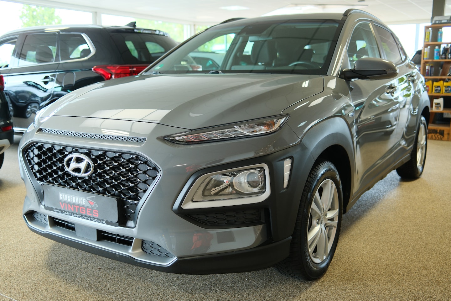 Hyundai Kona - 1.6 GDI HEV Comfort Smart Navigatie, Stoelverwarming, Camera, PDC - AutoWereld.nl