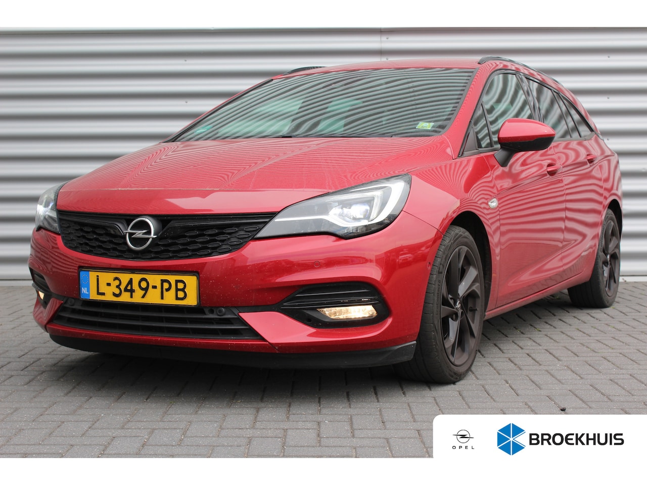Opel Astra Sports Tourer - 1.2 TURBO 130PK LAUNCH ELEGANCE+ / NAVI / LEDER / CLIMA / FULL-LED / PDC / CAMERA / 17" LM - AutoWereld.nl