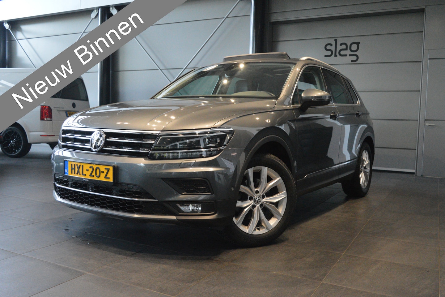 Volkswagen Tiguan - 1.4 TSI ACT Highline navi pano leer camera trekhaak 150 pk !! - AutoWereld.nl