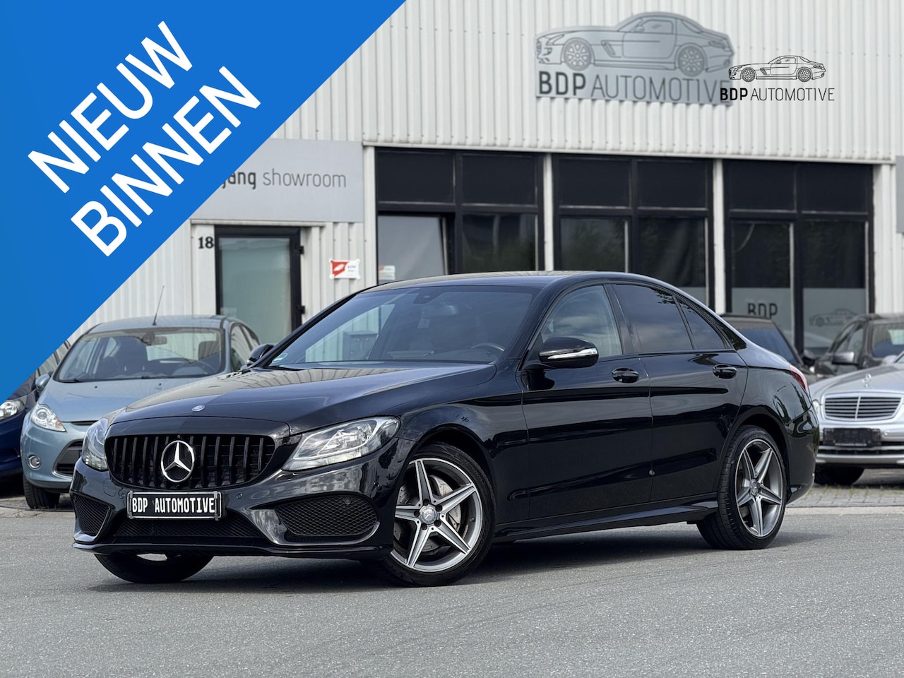Mercedes-Benz C-klasse - 200 Prestige AMG/18'' LM/BURMESTER/LEER/STOELVERWARMING/AUTOMAAT - AutoWereld.nl