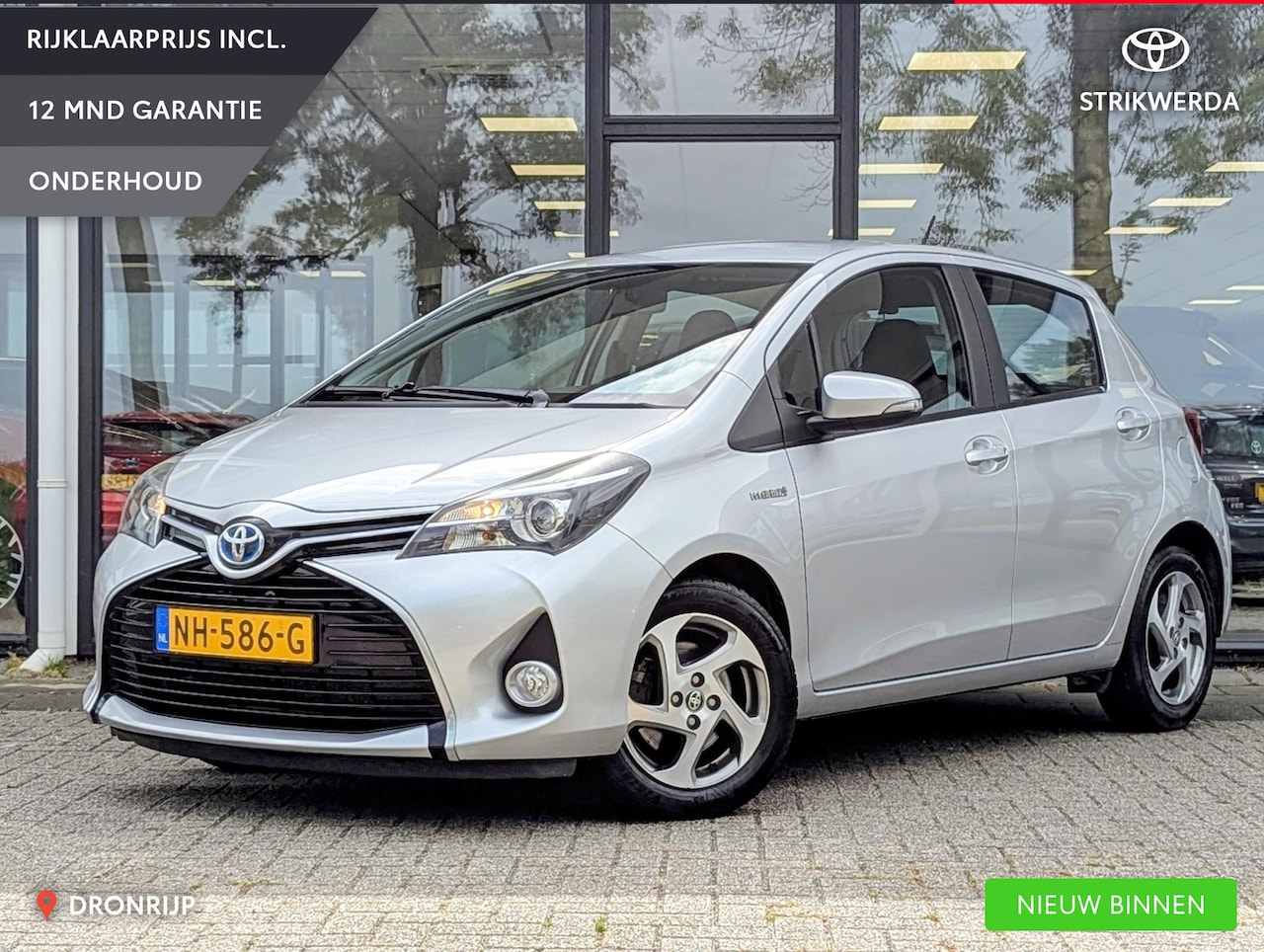 Toyota Yaris - 1.5 Hybrid Trend Bi-Tone Limited | Camera | Climate control | Elek. ramen | Navi | 15" Lic - AutoWereld.nl