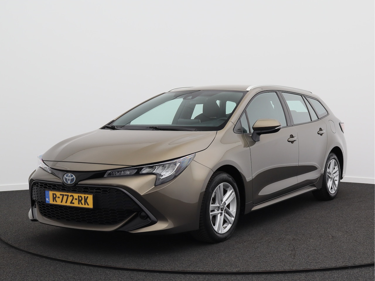 Toyota Corolla Touring Sports - 1.8 Hybrid Active/ lage km/ zeer mooi! - AutoWereld.nl