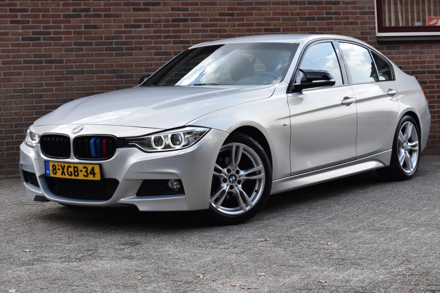 BMW 3-serie - 320i High Executive '14 Xenon Leder Clima M Pakket Navi Clima Cruise - AutoWereld.nl