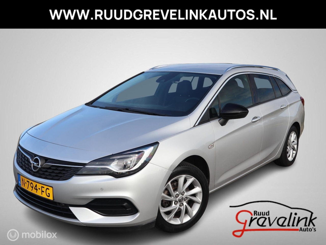 Opel Astra Sports Tourer - 131 PK Turbo H6 (Facelift) Elegance Navi Leer/Alcantara Camera Led Chroom DonkerGlas - AutoWereld.nl
