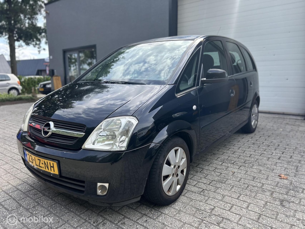 Opel Meriva - 1.6-16V Cosmo / NIEUWE APK / AIRCO / - AutoWereld.nl