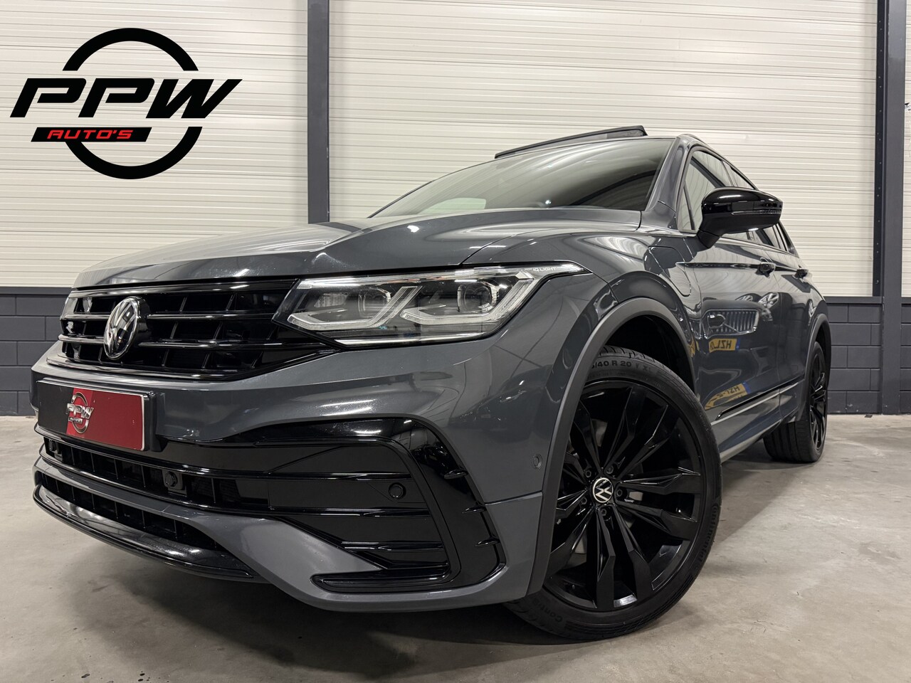 Volkswagen Tiguan - 1.4 TSI eHybrid R-Line DELFINGRAU/VIENNA-LEER/PANO/HEAD-UP/IQ-LIGHT/20"BLACK/ACC/SFEER/VIR - AutoWereld.nl