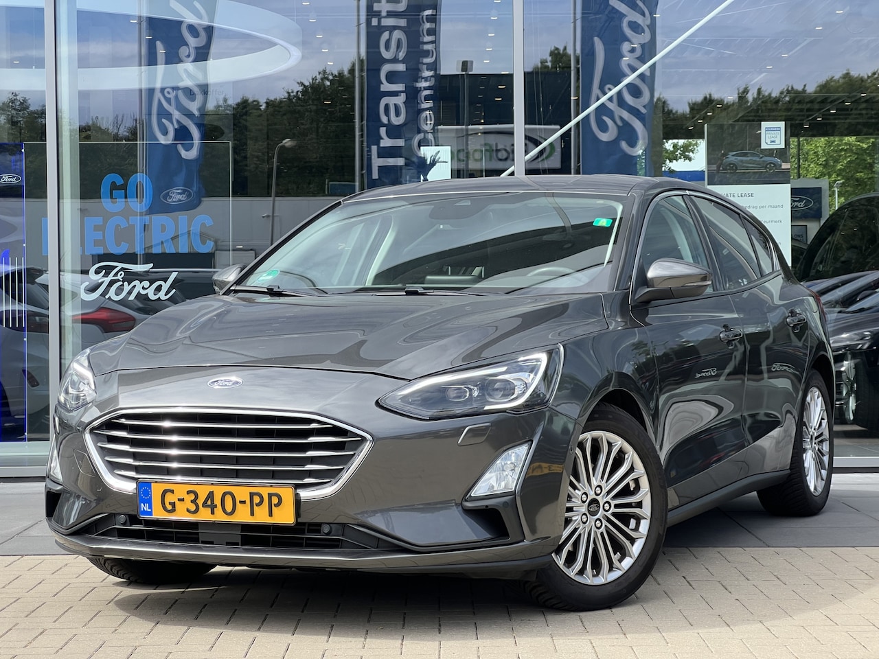 Ford Focus - 1.0 EcoBoost Titanium | Full LED | Adaptive Cruise | Camera | Winter Pack | Navigatie | Ap - AutoWereld.nl