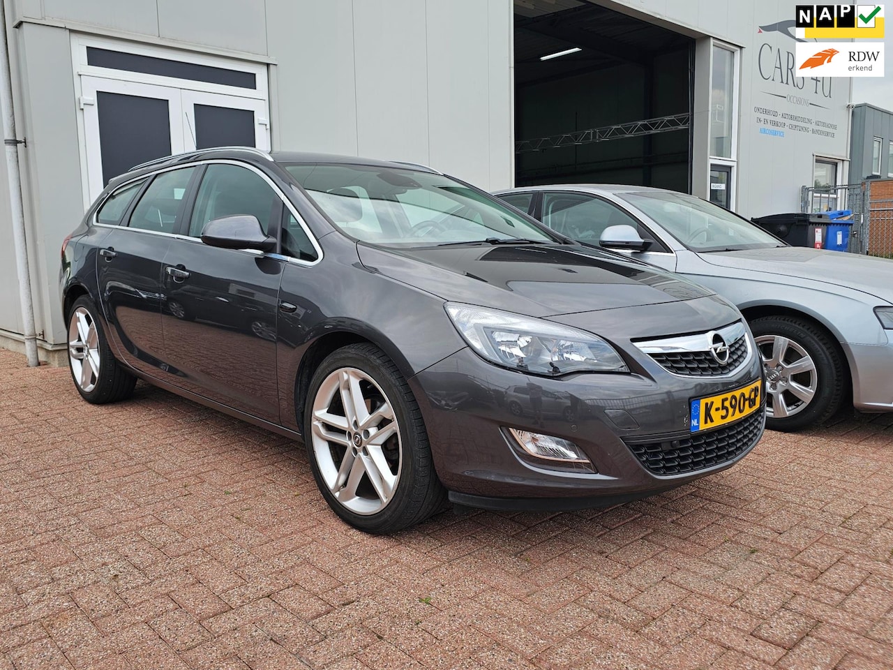 Opel Astra Sports Tourer - 1.4 Turbo Sport 1.4 Turbo Sport - AutoWereld.nl