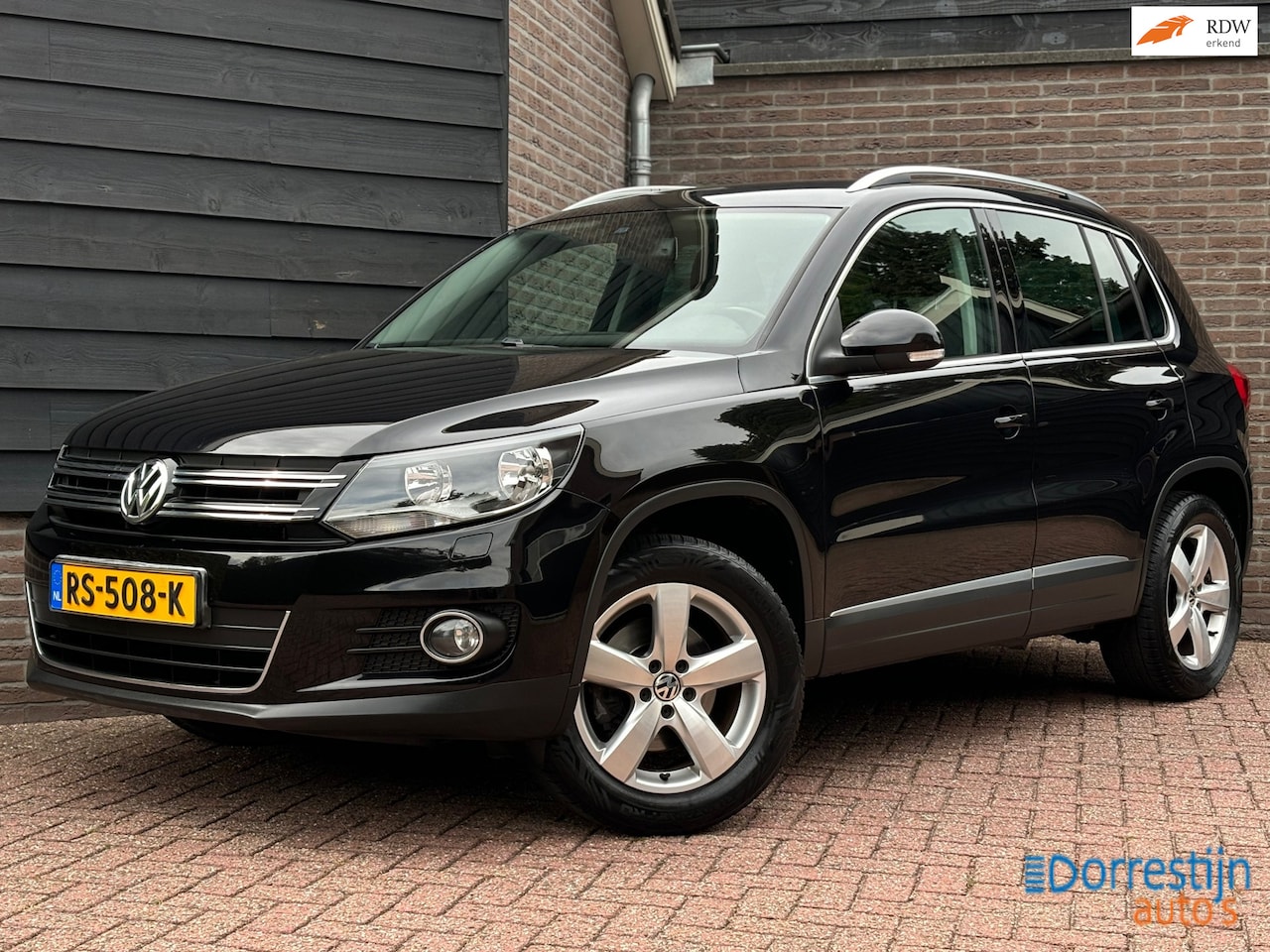 Volkswagen Tiguan - 1.4 TSI Sport&Style | Trekhaak | Navi | PDC | Cruise | Stoelverwarming - AutoWereld.nl