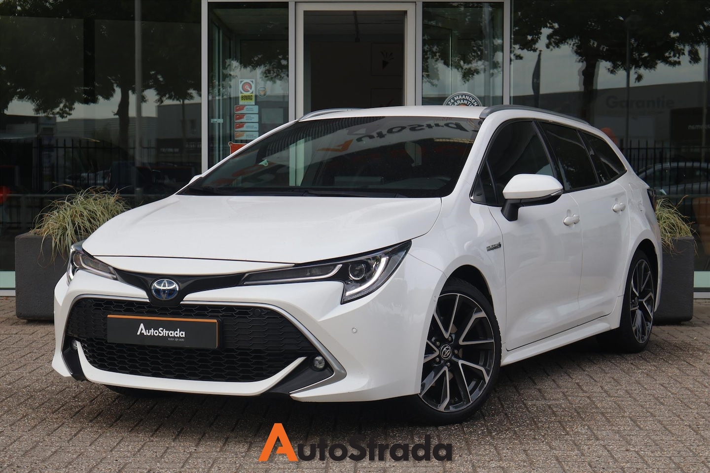 Toyota Corolla Touring Sports - 2.0 Executive Hybrid 184pk | Head-Up | Camera | Carplay | Navi | LED | Dodehoek | Camera - AutoWereld.nl