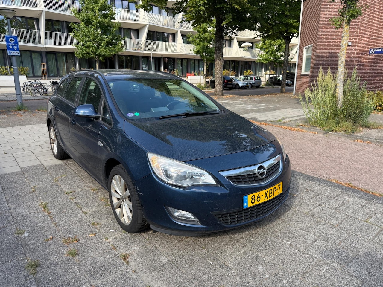 Opel Astra Sports Tourer - 1.4 Turbo Anniversary Ed Airco Cruise Trekhaak NAP - AutoWereld.nl