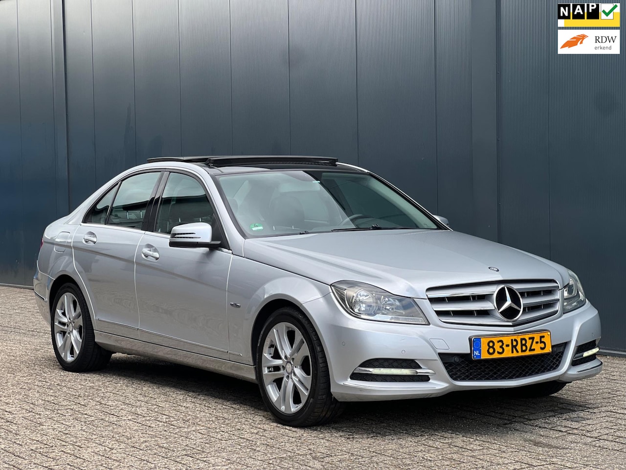 Mercedes-Benz C-klasse - 180 Facelift|Pano|AUT|Avantgarde|NAP|APK - AutoWereld.nl