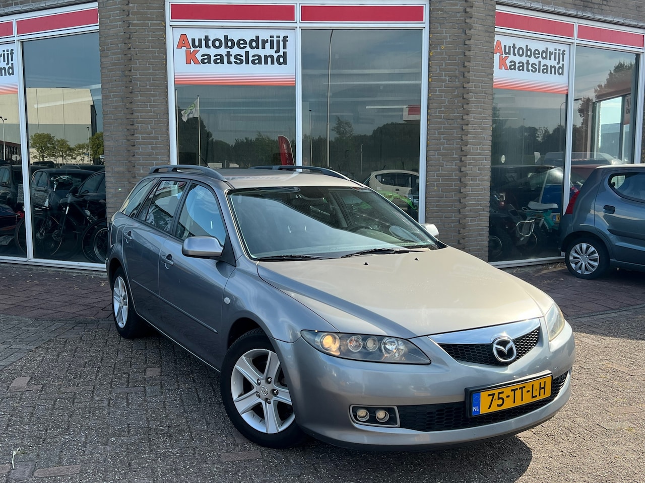 Mazda 6 Sportbreak - 1.8i Touring - Clima - Cruise - - AutoWereld.nl