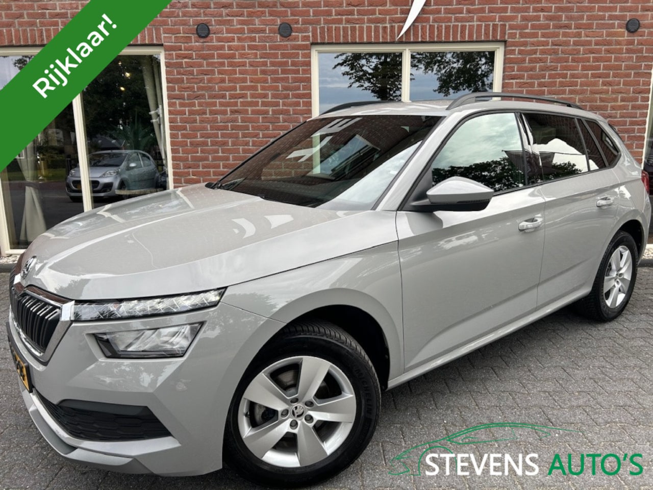 Skoda Kamiq - 1.0 TSI Sport bns STOELVERW. / SPORTSTOELEN / LED / LANE&FRONT A - AutoWereld.nl
