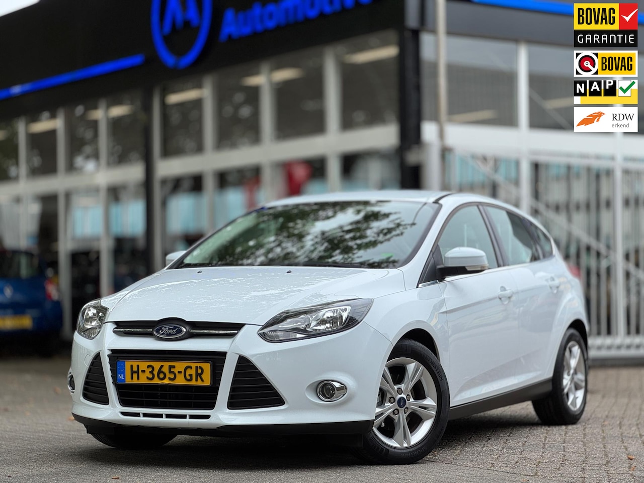 Ford Focus - 1.0 Champions League Navi Nw APK Stoel VW Park.sensoren Airco LM velgen - AutoWereld.nl