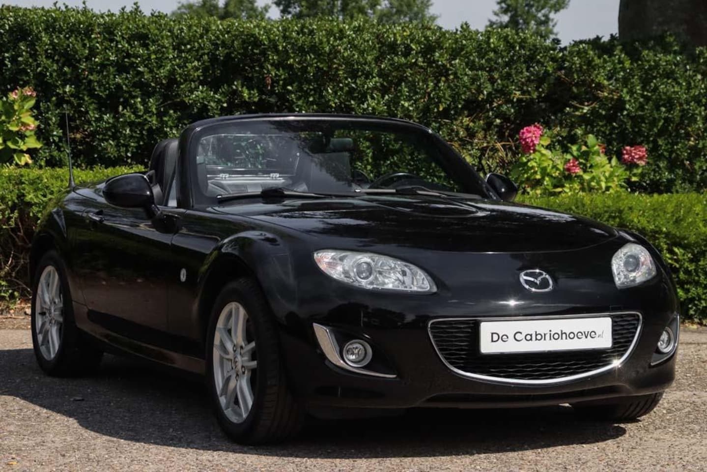Mazda MX-5 Roadster Coupé - NC 1.8l Stralend Zwart Doorzichtig - AutoWereld.nl